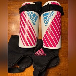 Adidas Black and Pink kid’s shin guards